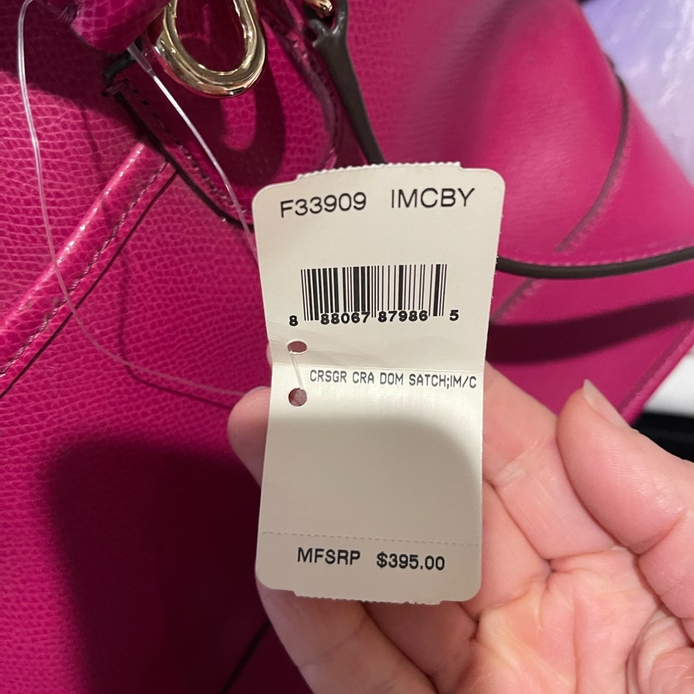 Coach Dom Satch Fuchsia pink new with tag. Has a long removable strap